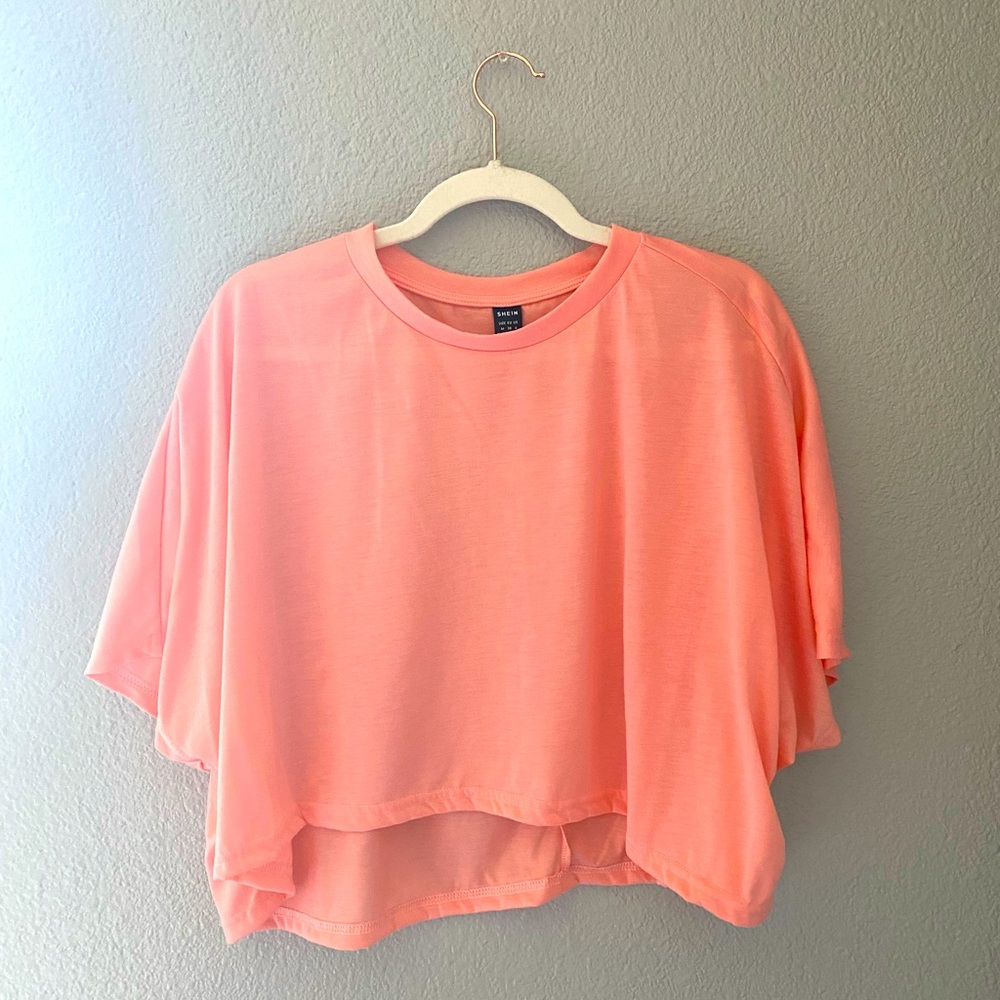 New pink cropped shirt sleeve tee. Cute for springy and summer wear.